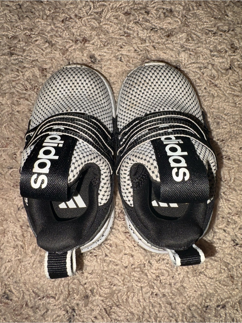 adidas toddler Black and White Slip-On Athletic Shoes